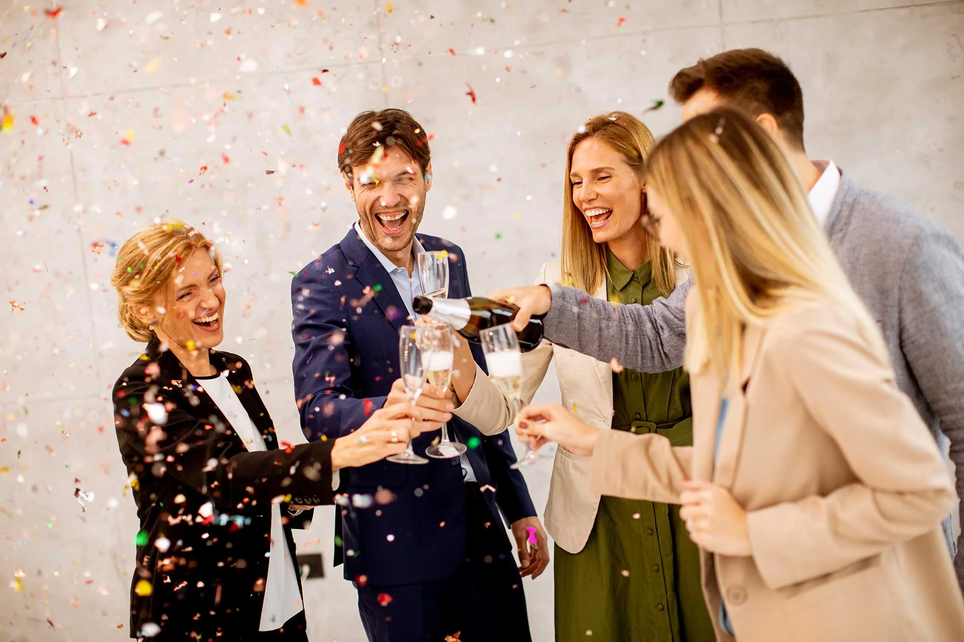 group-of-business-people-celebrating-and-toasting-2023-11-27-05-15-55-utc.jpg